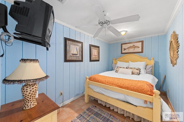 bedroom featuring ceiling fan, light tile patterned flooring, and ornamental molding