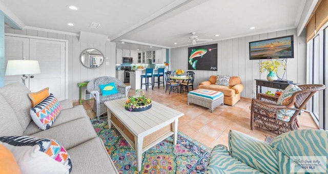 6201 Padre Blvd Unit 106, South Padre Island, TX 78597 - living room with ornamental molding, ceiling fan, recessed lighting, and light tile patterned floors