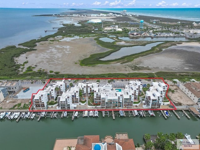 6201 Padre Blvd Unit 106, South Padre Island, TX 78597 - aerial view of property's location with a large body of water and property parcel outlined