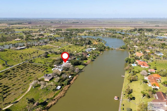 aerial view featuring a water view and a rural view