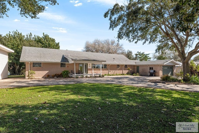 ranch-style house with a front lawn