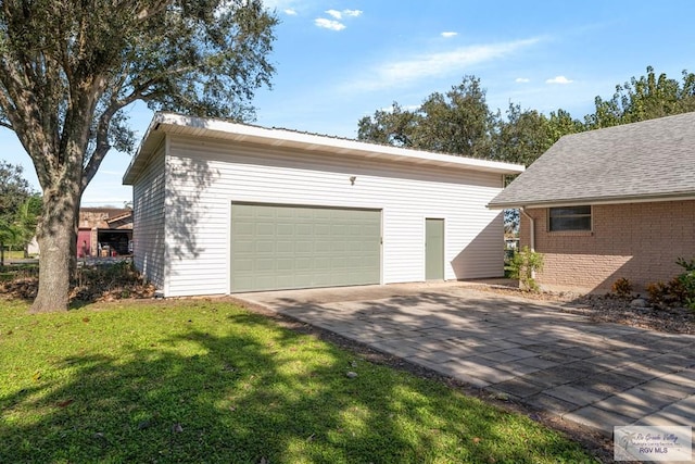 garage featuring driveway