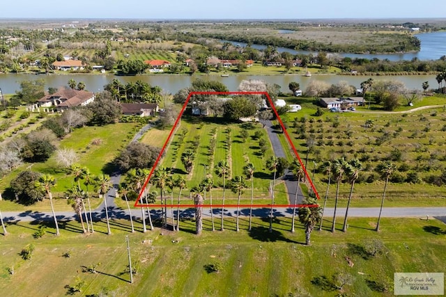 bird's eye view with a water view