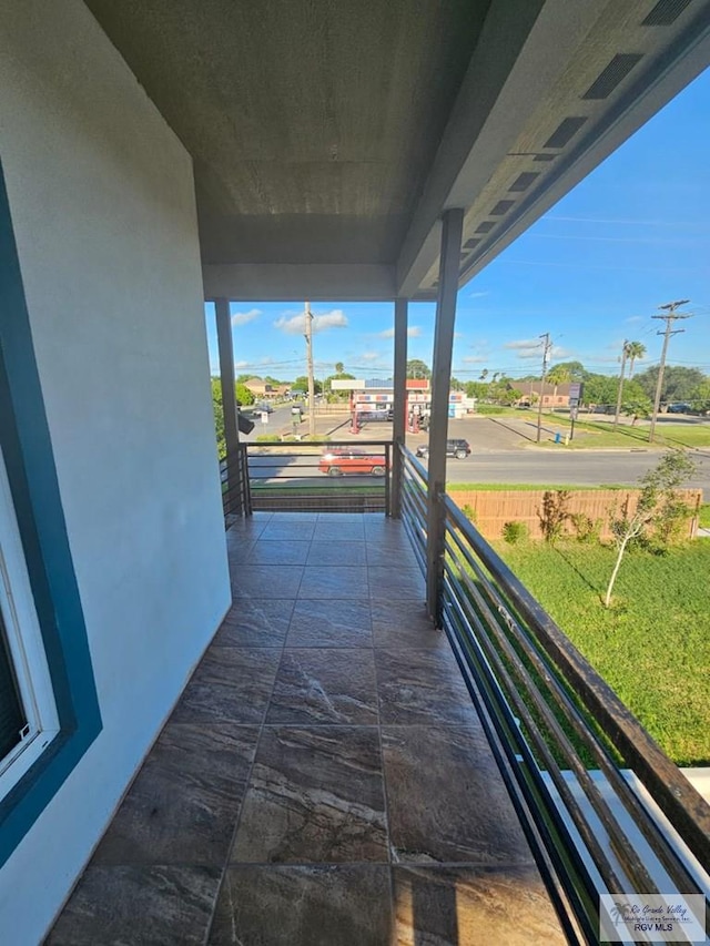 balcony featuring a porch