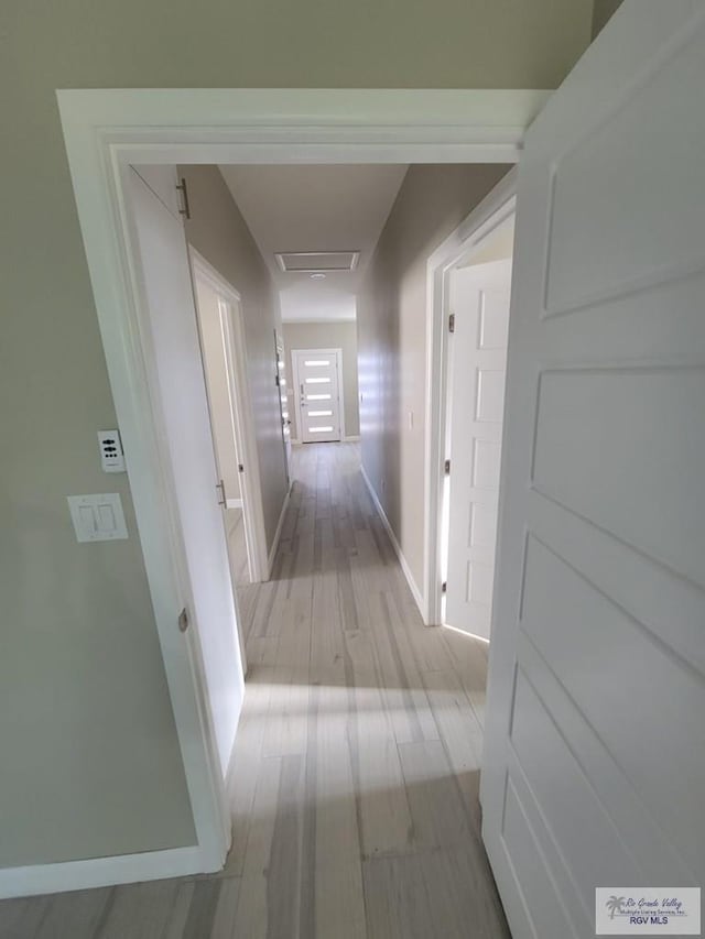 hallway featuring light wood-type flooring