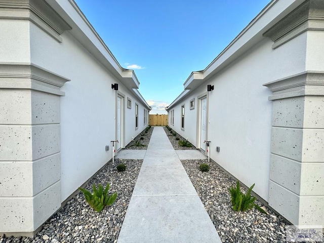 1505 Shavano Dr, Edinburg, TX 78541 - view of home's exterior with fence and stucco siding