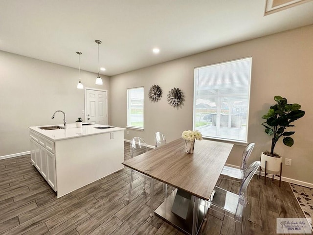 1505 Shavano Dr, Edinburg, TX 78541 - dining room with dark wood-type flooring, baseboards, and recessed lighting
