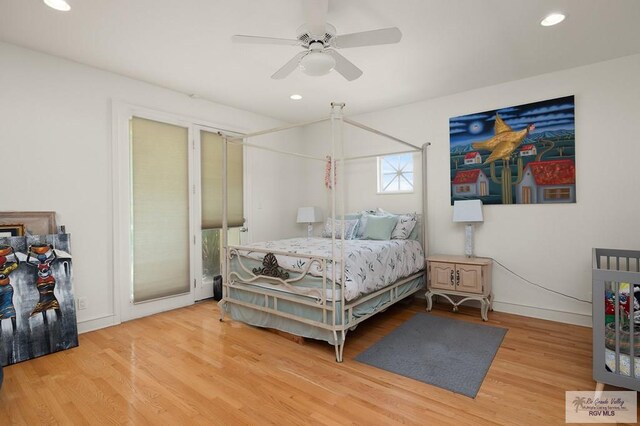 bedroom featuring ceiling fan and wood-type flooring