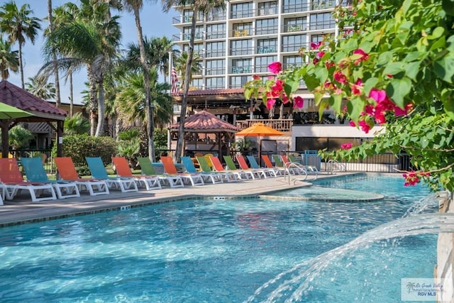 view of pool featuring a gazebo and a patio area