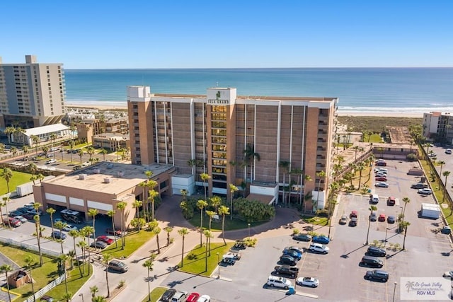 bird's eye view with a beach view and a water view