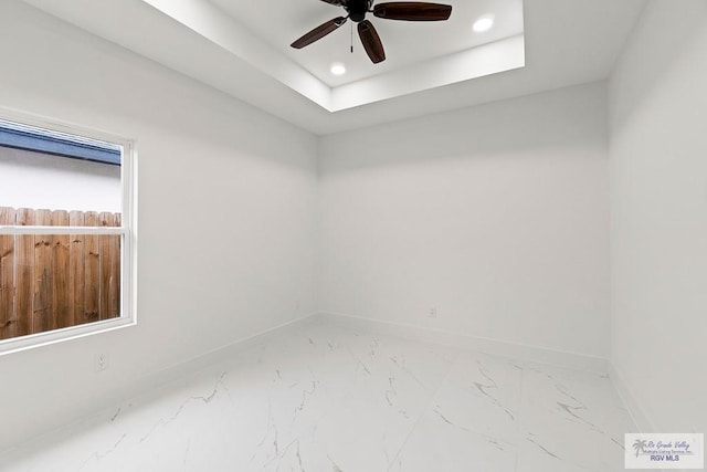 unfurnished room featuring baseboards, recessed lighting, a ceiling fan, and marble finish floor