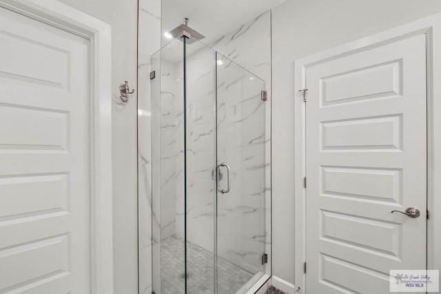 bathroom with an enclosed shower