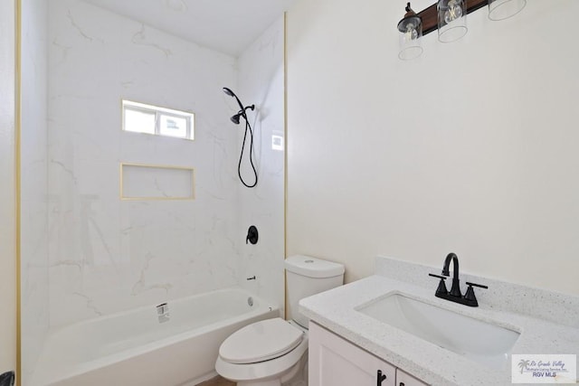 32773 Jorge St, Los Fresnos, TX 78566 - bathroom featuring toilet, vanity, and shower / washtub combination