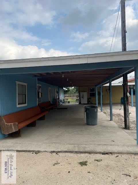 view of car parking featuring a carport