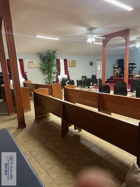reception area with ceiling fan