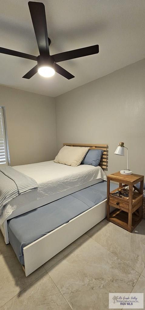 bedroom featuring ceiling fan