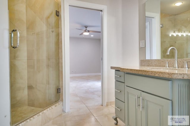 bathroom featuring vanity, tile patterned floors, ceiling fan, walk in shower, and radiator heating unit