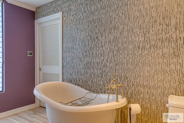 171 Line 17 Rd, San Benito, TX 78586 - full bath featuring wallpapered walls, wood finished floors, a soaking tub, and crown molding