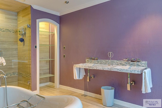 171 Line 17 Rd, San Benito, TX 78586 - full bathroom with a freestanding tub, wood finished floors, ornamental molding, and tiled shower