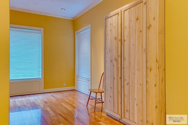 171 Line 17 Rd, San Benito, TX 78586 - unfurnished room with crown molding and wood finished floors