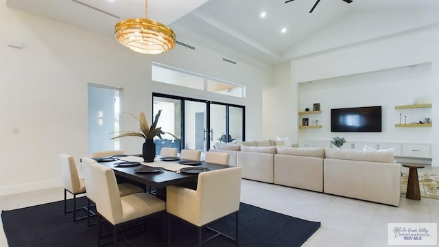 60 Jacklyn St, Rancho Viejo, TX 78575 - tiled dining space featuring ceiling fan, high vaulted ceiling, and french doors