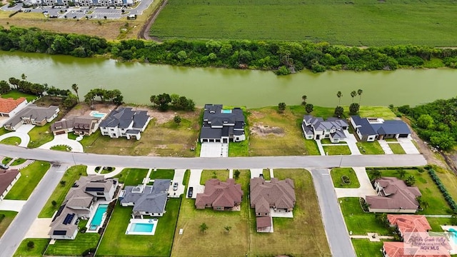 60 Jacklyn St, Rancho Viejo, TX 78575 - birds eye view of property featuring a water view