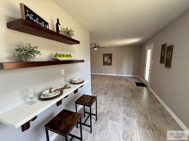 902 Rio Hondo Rd, Harlingen, TX 78550 - dining area featuring ceiling fan and baseboards