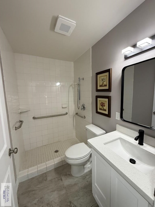 902 Rio Hondo Rd, Harlingen, TX 78550 - bathroom with vanity, a shower stall, and toilet