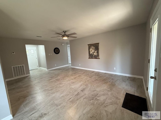 902 Rio Hondo Rd, Harlingen, TX 78550 - empty room with ceiling fan and baseboards