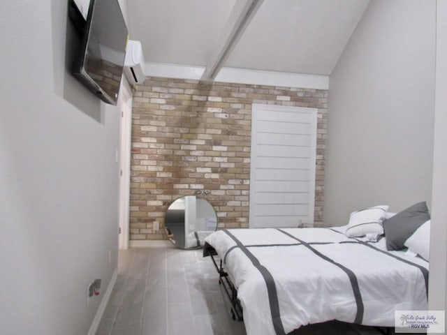 bedroom with hardwood / wood-style flooring and lofted ceiling with beams