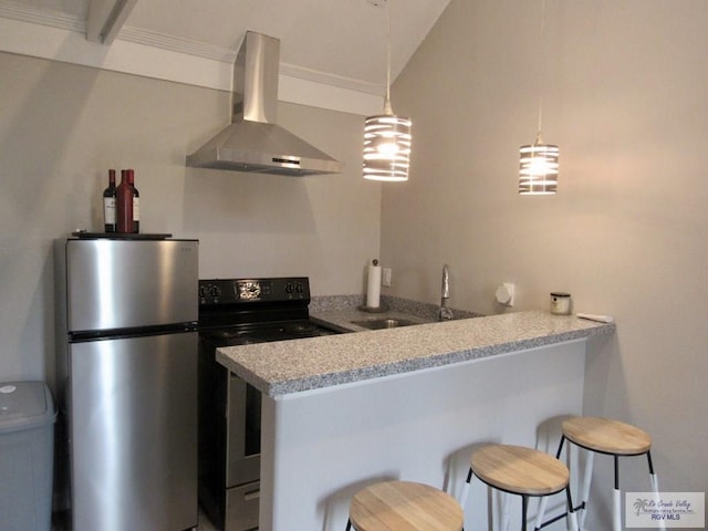 kitchen featuring light stone countertops, stainless steel appliances, wall chimney range hood, kitchen peninsula, and a breakfast bar