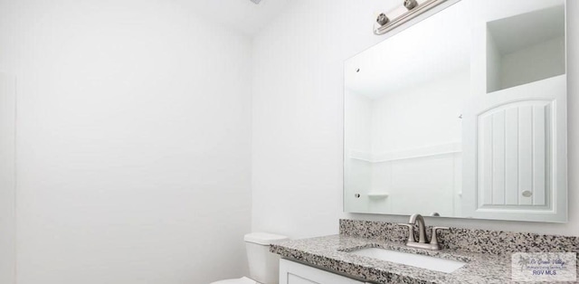 33521 Stanford Rd, Los Fresnos, TX 78566 - half bathroom with vanity and toilet