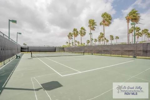 view of sport court featuring basketball hoop