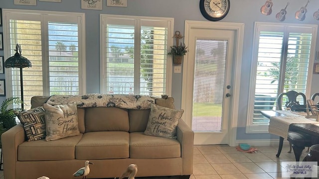 interior space with a wealth of natural light and light tile patterned flooring