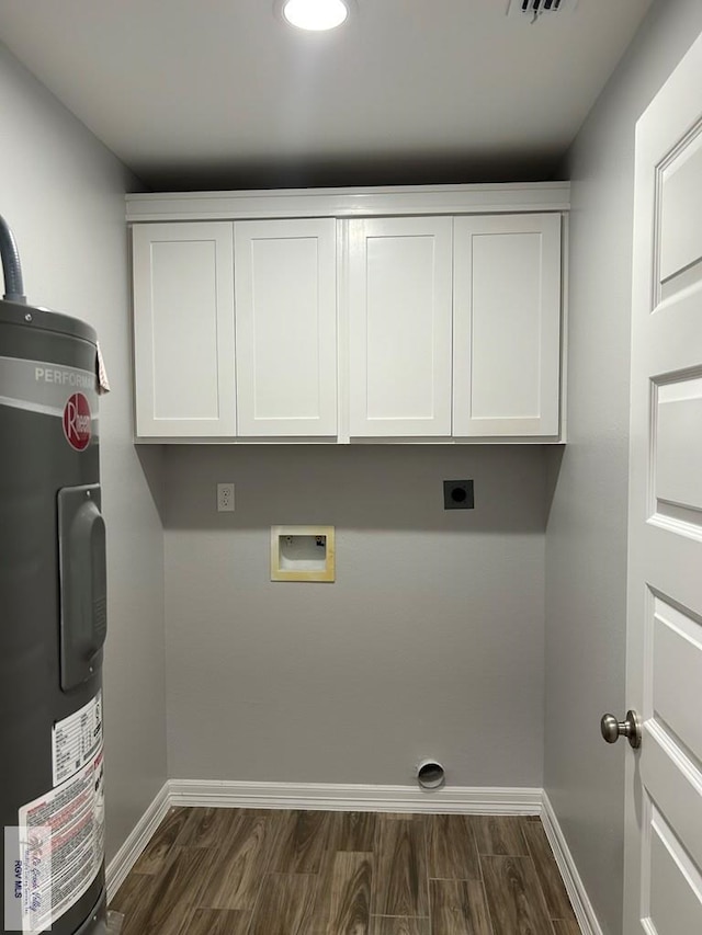 washroom with water heater, dark wood-style floors, hookup for an electric dryer, and baseboards