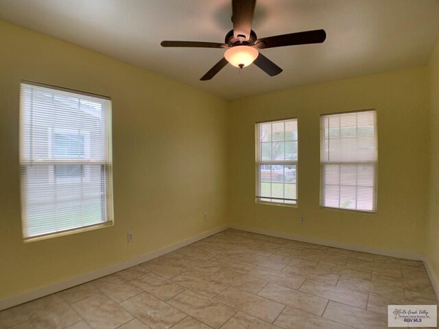 205 W Beck Ave, Harlingen, TX 78550 - spare room with ceiling fan and baseboards