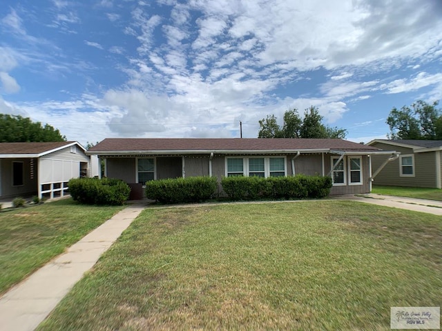 205 W Beck Ave, Harlingen, TX 78550 - single story home with a front lawn