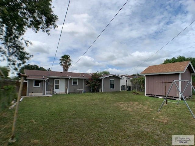 205 W Beck Ave, Harlingen, TX 78550 - view of yard featuring a shed