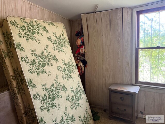 2044 E Jackson St, Brownsville, TX 78520 - bedroom with wooden walls