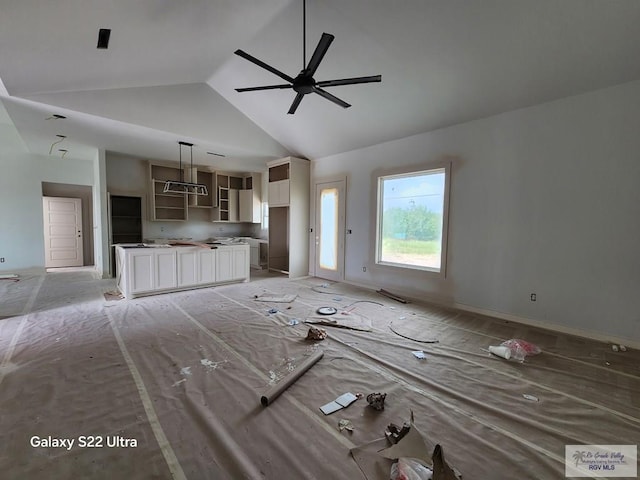 9848 Heights N, Harlingen, TX 78552 - unfurnished living room featuring high vaulted ceiling and ceiling fan