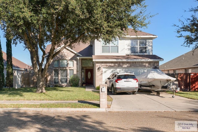 traditional-style home with an attached garage, brick siding, fence, driveway, and a front lawn