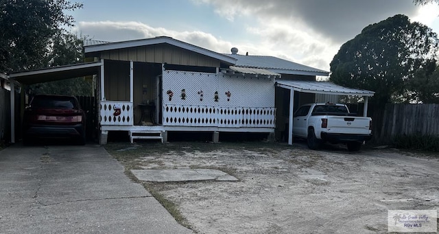 manufactured / mobile home featuring a carport