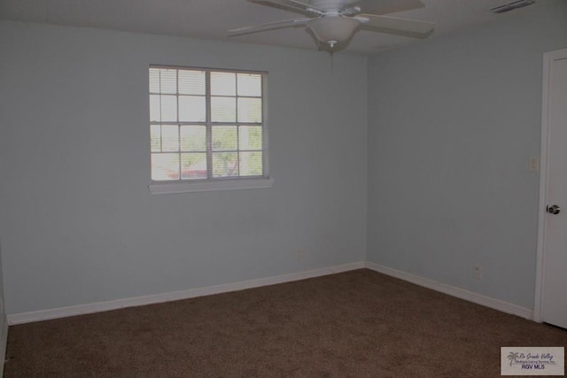 1725 Peach Tree Ct, Harlingen, TX 78550 - empty room featuring ceiling fan, dark carpet, and baseboards