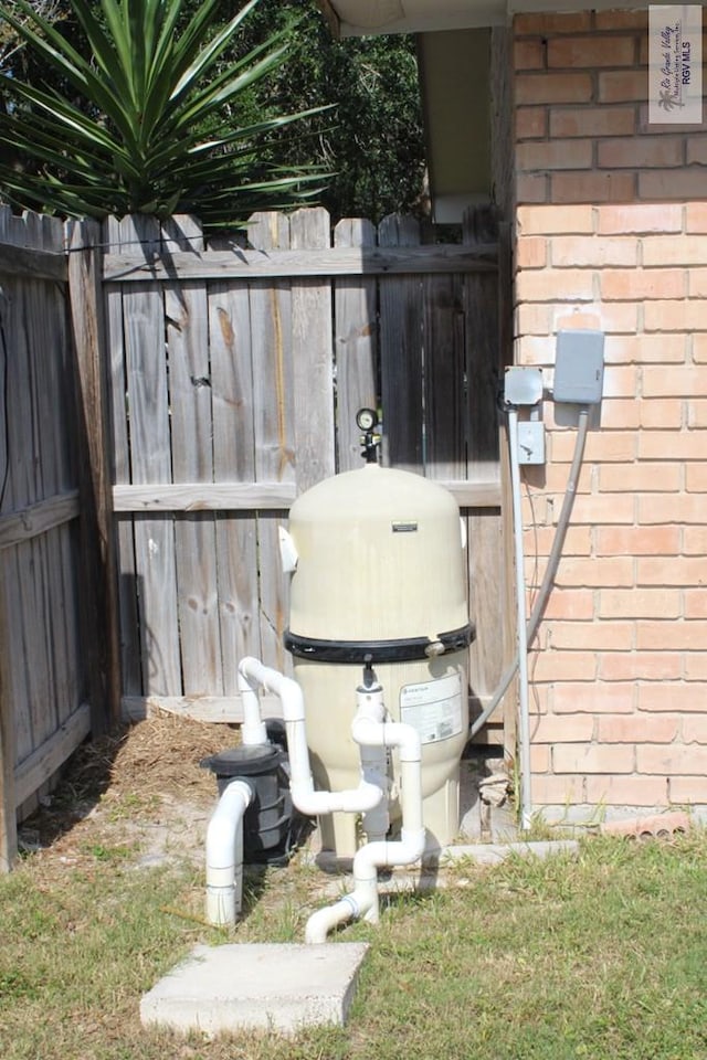 1725 Peach Tree Ct, Harlingen, TX 78550 - exterior view of pump