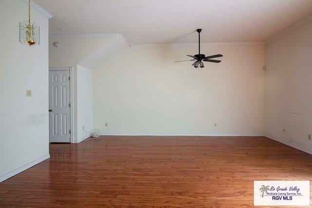 interior space featuring crown molding, ceiling fan, and wood-type flooring