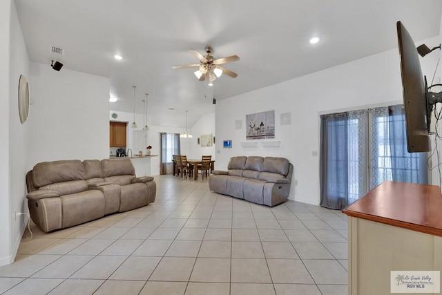 living room with a ceiling fan, recessed lighting, visible vents, and light tile patterned floors