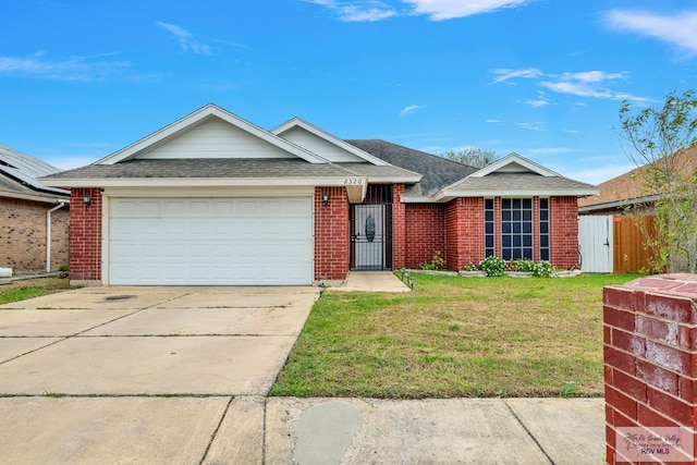 single story home with a garage, brick siding, concrete driveway, roof with shingles, and a front lawn