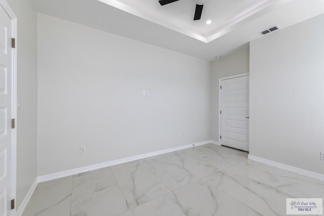 unfurnished room featuring recessed lighting, marble finish floor, visible vents, a ceiling fan, and baseboards