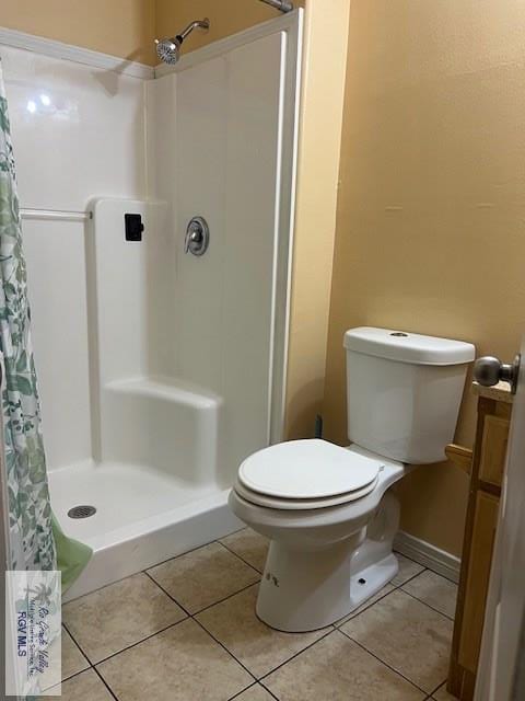 1327 W Johnson Ave, Harlingen, TX 78550 - full bath with a shower with curtain, tile patterned flooring, and toilet