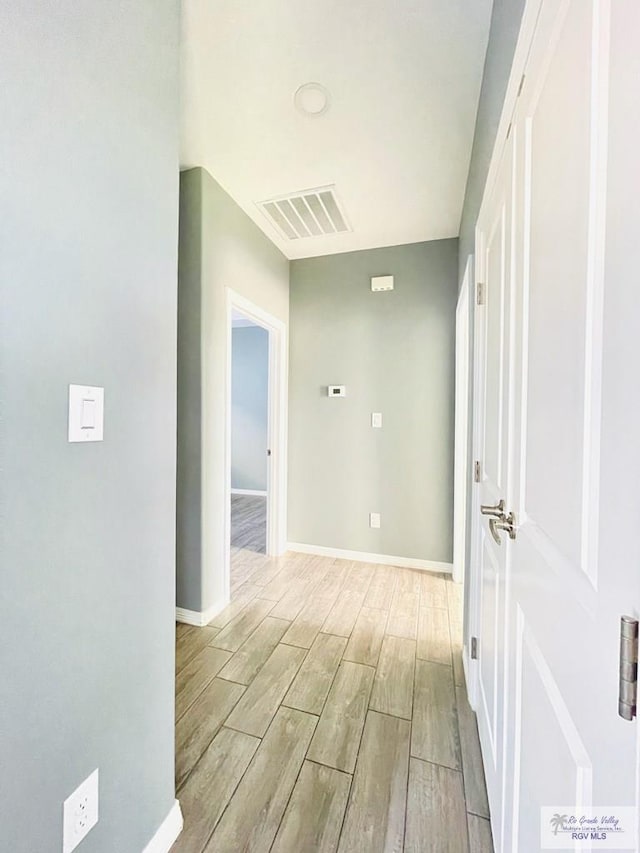 hall featuring light wood-type flooring